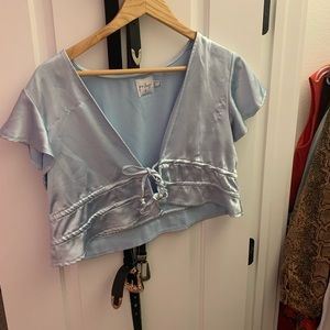 Front body blue satin cropped shirt